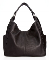Bring daytime style to new heights with this luxurious leather hobo from Calvin Klein. It's an effortless over-the-shoulder style, accented with understated hardware and plenty of pockets to stow all the essentials. Bring daytime style to new heights with this luxurious leather hobo from Calvin Klein. It's an effortless over-the-shoulder style, accented with understated hardware and plenty of pockets to stow all the essentials.