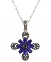 Crossover appeal. This necklace from City by City is crafted from silver-tone nickel-free metal with a cross pendant featuring glass marcasite- and Montana-tone crystals for a bold touch. Approximate length: 15 inches + 3-inch extender. Approximate drop: 1 inch. Crossover appeal. This necklace from City by City is crafted from silver-tone nickel-free metal with a cross pendant featuring glass marcasite- and Montana-tone crystals for a bold touch. Approximate length: 15 inches + 3-inch extender. Approximate drop: 1 inch.