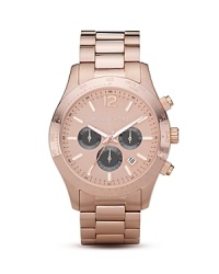 On-trend and ultra-luxe, this gleaming rose-gold tone watch with three-eye design sets your look to chic. From MICHAEL Michael Kors. On-trend and ultra-luxe, this gleaming rose-gold tone watch with three-eye design sets your look to chic. From MICHAEL Michael Kors.