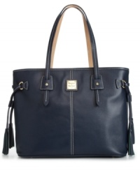 Ideal for the gal who doesn't travel light, this on-the-go shopper is perfect for stashing all your daily necessities in style. Shiny hardware and a signature plaque finishes off this sleek Dooney & Bourke design. Ideal for the gal who doesn't travel light, this on-the-go shopper is perfect for stashing all your daily necessities in style. Shiny hardware and a signature plaque finishes off this sleek Dooney & Bourke design.