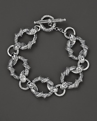 Intricately detailed sterling silver snake links twine around your wrist, recalling ancient Greek myths and legends. By Konstantino. Intricately detailed sterling silver snake links twine around your wrist, recalling ancient Greek myths and legends. By Konstantino.