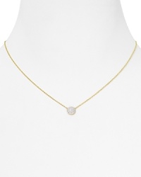 Beautiful and delicate cubic zirconia stones illuminate simple, a Crislu pendant necklace - so gorgeous, contrasted against a pure 18K gold setting. Beautiful and delicate cubic zirconia stones illuminate simple, a Crislu pendant necklace - so gorgeous, contrasted against a pure 18K gold setting.