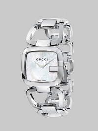 A signature style with a mother-of-pearl dial and a stainless steel bracelet. Quartz movementWater resistant to 3 ATMSquared stainless steel case, 32mm (1.2) X 30mm (1.1)Smooth bezelWhite mother-of-pearl dial with markersStainless steel link braceletMade in Switzerland A signature style with a mother-of-pearl dial and a stainless steel bracelet. Quartz movementWater resistant to 3 ATMSquared stainless steel case, 32mm (1.2) X 30mm (1.1)Smooth bezelWhite mother-of-pearl dial with markersStainless steel link braceletMade in Switzerland