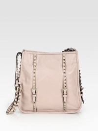 Sleek studs and buckle detail add rock and roll glamour to this roomy leather design. Studded leather shoulder strap, 14½ dropMagnetic snap closureOne inside zip pocketTwo inside open pocketsCotton lining10¾W X 11¼H X 2½DMade in Italy Sleek studs and buckle detail add rock and roll glamour to this roomy leather design. Studded leather shoulder strap, 14½ dropMagnetic snap closureOne inside zip pocketTwo inside open pocketsCotton lining10¾W X 11¼H X 2½DMade in Italy