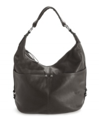 A polished leather hobo from Tignanello with plenty of pockets to keep you and your essentials organized. A polished leather hobo from Tignanello with plenty of pockets to keep you and your essentials organized.