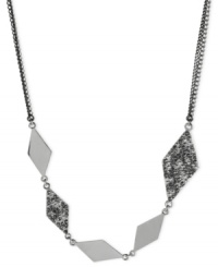 Diamond shapes dance around this frontal necklace from Kenneth Cole New York. Crafted from silver-tone mixed metal, the necklace is offset with glimmering pave glass crystal accents. Approximate length:19 inches + 3-inch extender. Approximate drop: 4/5 inch. Diamond shapes dance around this frontal necklace from Kenneth Cole New York. Crafted from silver-tone mixed metal, the necklace is offset with glimmering pave glass crystal accents. Approximate length:19 inches + 3-inch extender. Approximate drop: 4/5 inch.