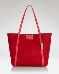 Understated and ever-chic. Milly's polished style proves practical with this top handle tote, crafted from durable nylon and sized to stow the essentials (and maybe a few extras.) Understated and ever-chic. Milly's polished style proves practical with this top handle tote, crafted from durable nylon and sized to stow the essentials (and maybe a few extras.)