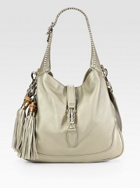 Metallic leather finished with a hand-stitched top handle and chic bamboo and leather tassels.Double top handles, 9 dropRemovable shoulder strap, 18 dropPush-lock closureOne inside zip pocketTwo inside open pocketsCotton lining13½W X 11½H X 2DMade in Italy Metallic leather finished with a hand-stitched top handle and chic bamboo and leather tassels.Double top handles, 9 dropRemovable shoulder strap, 18 dropPush-lock closureOne inside zip pocketTwo inside open pocketsCotton lining13½W X 11½H X 2DMade in Italy