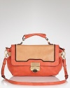 Color block your way to cool with this Treesje satchel, cast in rich leather. It's the pop showpiece to carry now.