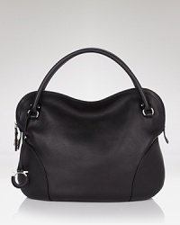 A sleek, chic leather hobo with contemporary panel details and a clever lockable top zip. By Salvatore Ferragamo. A sleek, chic leather hobo with contemporary panel details and a clever lockable top zip. By Salvatore Ferragamo.