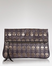 It's impossible not to love the edgy cool of this Treesje leather clutch. Plus, this piece's party perfect proportions keep all the evening essentials in check. It's impossible not to love the edgy cool of this Treesje leather clutch. Plus, this piece's party perfect proportions keep all the evening essentials in check.