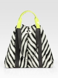 An eclectic print on sturdy canvas defines this roomy carryall, topped with patent leather handles.Leather double top handles, 4½ dropWebbed shoulder straps, 10 dropTop snap closureOne inside snap-button pouchCotton lining8½W X 14¼H X 21½DImported An eclectic print on sturdy canvas defines this roomy carryall, topped with patent leather handles.Leather double top handles, 4½ dropWebbed shoulder straps, 10 dropTop snap closureOne inside snap-button pouchCotton lining8½W X 14¼H X 21½DImported
