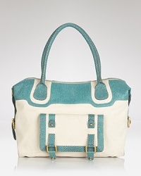 Canvas and leather make a cool colorblocked statement on this roomy tote from Treesje. Practical and perfectly on-trend, turns out two tones are better than one. Canvas and leather make a cool colorblocked statement on this roomy tote from Treesje. Practical and perfectly on-trend, turns out two tones are better than one.