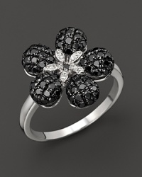 Black and white diamonds in 14K white gold flower setting. Black and white diamonds in 14K white gold flower setting.
