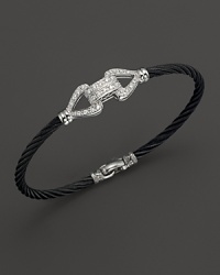 18K white gold and black steel cable bangle with diamond pavé. 18K white gold and black steel cable bangle with diamond pavé.