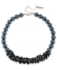 Elegance comes front and center in this necklace from Kenneth Cole New York. Crafted from silver-tone mixed metal, navy glass pearls offset a cluster of glass accents for an appealing look. Item comes packaged in a signature Kenneth Cole New York Gift Box. Approximate length: 16 inches + 3-inch extender. Approximate drop: 3/4 inch. Elegance comes front and center in this necklace from Kenneth Cole New York. Crafted from silver-tone mixed metal, navy glass pearls offset a cluster of glass accents for an appealing look. Item comes packaged in a signature Kenneth Cole New York Gift Box. Approximate length: 16 inches + 3-inch extender. Approximate drop: 3/4 inch.