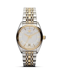 Designed to keep pace with the day-to-day demands, this two-tone stainless steel watch from Emporio Armani is a sleek choice. With a gold plated case, silver dial and quartz movement, this watch has the substance to match the style. Designed to keep pace with the day-to-day demands, this two-tone stainless steel watch from Emporio Armani is a sleek choice. With a gold plated case, silver dial and quartz movement, this watch has the substance to match the style.