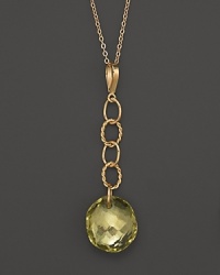 Oval freeform lemon citrine briolettes add rich sparkle to links of 14K yellow gold. By Nancy B. Oval freeform lemon citrine briolettes add rich sparkle to links of 14K yellow gold. By Nancy B.