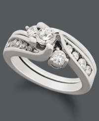 Exquisite design and a lot of sparkle. This stunning bridal set combines a unique pattern of certified, round-cut diamonds (1 ct. t.w.) set in polished 14k white gold. Exquisite design and a lot of sparkle. This stunning bridal set combines a unique pattern of certified, round-cut diamonds (1 ct. t.w.) set in polished 14k white gold.