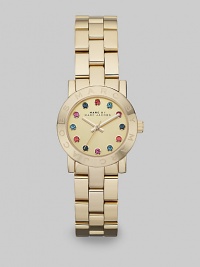 A radiant goldtone ion-plated stainless steel style with multicolored stone markers for a pop of color. Quartz movementWater resistant to 5 ATMRound goldtone ion-plated stainless steel case, 26mm (1)Logo etched bezelGoldtone dialMulticolored glass stone hour markersSecond hand Goldtone ion-plated stainless steel link braceletImported A radiant goldtone ion-plated stainless steel style with multicolored stone markers for a pop of color. Quartz movementWater resistant to 5 ATMRound goldtone ion-plated stainless steel case, 26mm (1)Logo etched bezelGoldtone dialMulticolored glass stone hour markersSecond hand Goldtone ion-plated stainless steel link braceletImported
