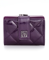 Take a shine to everyday accessorizing with this glossy goodie from Style&co. Ideally sized to slip inside a handbag, it boasts plenty of pockets and compartments to stow your stash. Take a shine to everyday accessorizing with this glossy goodie from Style&co. Ideally sized to slip inside a handbag, it boasts plenty of pockets and compartments to stow your stash.
