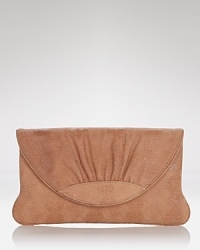 Epitomizing understated luxury, Lauren Merkin's leather clutch features an classic, angular shape and subtle hit of on-trend texture. Epitomizing understated luxury, Lauren Merkin's leather clutch features an classic, angular shape and subtle hit of on-trend texture.