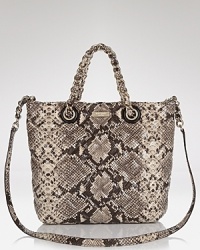 Classically styled, this kate spade new york handbag is one of our new musts. Embossed, snakeskin leather always feels polished but especially here with a by-the-hand silhouette. Classically styled, this kate spade new york handbag is one of our new musts. Embossed, snakeskin leather always feels polished but especially here with a by-the-hand silhouette.