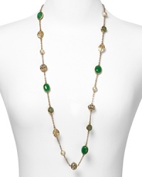 Splashed with pearls, jade stones, and golden beads, this Carolee Lux necklace is a spectacular statement piece. Wear it to bring eclectic sparkle to your neckline. Splashed with pearls, jade stones, and golden beads, this Carolee Lux necklace is a spectacular statement piece. Wear it to bring eclectic sparkle to your neckline.