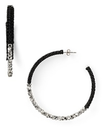 Cool and crafty. A simple shape gets a Gothic shot of color with these plated hoop earrings from Shashi, wrapped in black cord. Cool and crafty. A simple shape gets a Gothic shot of color with these plated hoop earrings from Shashi, wrapped in black cord.