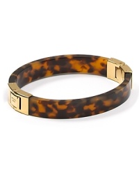 Classic cool. Wear MICHAEL Michael Kors' gold-hinged bangle to add burnished warmth to fall's cool looks. Classic cool. Wear MICHAEL Michael Kors' gold-hinged bangle to add burnished warmth to fall's cool looks.