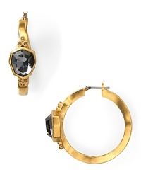 Bolder is better: T Tahari models statement style with this pair of hoop earrings, accented by allure-adding black diamond stones. Bolder is better: T Tahari models statement style with this pair of hoop earrings, accented by allure-adding black diamond stones.