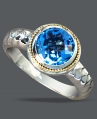 Make a bold statement with a vibrant cocktail ring. Balissima by Effy Collection's stunning style features a round-cut blue topaz (2-1/3 ct. t.w.) set in sterling silver with intricate rope edges crafted from 14k gold. Size 7. Make a bold statement with a vibrant cocktail ring. Balissima by Effy Collection's stunning style features a round-cut blue topaz (2-1/3 ct. t.w.) set in sterling silver with intricate rope edges crafted from 14k gold. Size 7.
