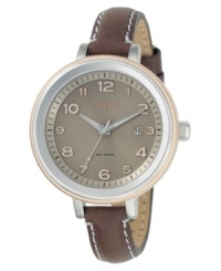 A charming and casual yet chic Bridgette watch from Fossil. Featuring a brown leather strap with contrast stitch. Two-tone stainless steel round case and round brown dial with logo, date window and numeral indices. Quartz movement. Water resistant to 100 meters. 11-year limited warranty. A charming and casual yet chic Bridgette watch from Fossil. Featuring a brown leather strap with contrast stitch. Two-tone stainless steel round case and round brown dial with logo, date window and numeral indices. Quartz movement. Water resistant to 100 meters. 11-year limited warranty.