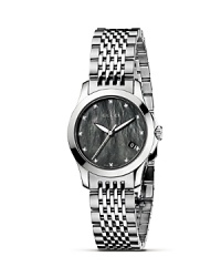 Modern and metropolitan, the Gucci G-Timeless Collection offers a highly contemporary design.Discerning customers will appreciate the iconic details that are the signature of all Gucci timepieces and indeed the House of Gucci. From the Gucci ‘G' shadow monogram on the watch face, to the Gucci diamond motif discreetly displayed on the dial, or the green-red-green web on the sports models, these finishing flourishes serve to underline the rich history behind this collection. Modern and metropolitan, the Gucci G-Timeless Collection offers a highly contemporary design.Discerning customers will appreciate the iconic details that are the signature of all Gucci timepieces and indeed the House of Gucci. From the Gucci ‘G' shadow monogram on the watch face, to the Gucci diamond motif discreetly displayed on the dial, or the green-red-green web on the sports models, these finishing flourishes serve to underline the rich history behind this collection.