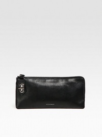 An ultra-thin shape of luxe leather for your on-the-go essentials. Top zip closure with a signature t-pin turnlockOne inside zip pocketTwo inside open pocketsFour inside credit card slotsLeather lining9W X 4½H X ¾DImported An ultra-thin shape of luxe leather for your on-the-go essentials. Top zip closure with a signature t-pin turnlockOne inside zip pocketTwo inside open pocketsFour inside credit card slotsLeather lining9W X 4½H X ¾DImported