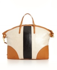 Keep on trend this season with the Jaycee Stripe Dome Tote from KDNY by Kelsi Dagger. Polished goldtone hardware and sleek colorblock detailing add of-the-moment appeal to this classic tote design. Keep on trend this season with the Jaycee Stripe Dome Tote from KDNY by Kelsi Dagger. Polished goldtone hardware and sleek colorblock detailing add of-the-moment appeal to this classic tote design.