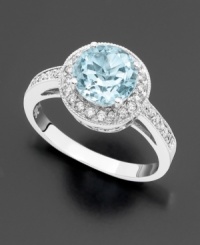 The icy dazzle of an round-cut aquamarine (1-3/8 ct. t.w.) is an ingenious complement to sparkling, full-cut diamonds (1/3 ct. t.w.). Set in 14k white gold. The icy dazzle of an round-cut aquamarine (1-3/8 ct. t.w.) is an ingenious complement to sparkling, full-cut diamonds (1/3 ct. t.w.). Set in 14k white gold.