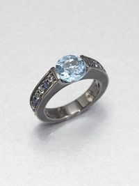 A simple, square-edged band is channel-set with an icy cool mix of blue sapphire, white topaz and blue topaz stones, creating an elegant showcase for a faceted pastel blue topaz.Sapphires, white topaz and blue topazBlack rhodium-plated sterling silverWidth, about .7Imported A simple, square-edged band is channel-set with an icy cool mix of blue sapphire, white topaz and blue topaz stones, creating an elegant showcase for a faceted pastel blue topaz.Sapphires, white topaz and blue topazBlack rhodium-plated sterling silverWidth, about .7Imported
