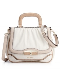 Stylish and sophisticated, this chic look from GUESS will easily add a refined appeal to any ensemble. Pale shiny goldtone hardware accents this top handle design from a feminine feel you will simply adore. Stylish and sophisticated, this chic look from GUESS will easily add a refined appeal to any ensemble. Pale shiny goldtone hardware accents this top handle design from a feminine feel you will simply adore.