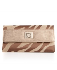 A stylish everyday wallet is essential for the modern girl-on-the-go. With a fashionable animal print exterior and ultra organized interior design, this wallet will take you anywhere in style. A stylish everyday wallet is essential for the modern girl-on-the-go. With a fashionable animal print exterior and ultra organized interior design, this wallet will take you anywhere in style.