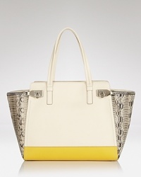 Blocked leather on this Salvatore Ferragamo satchel looks less trend-driven and more undeniably sophisticated, making this piece a must for your new season capsule wardrobe. Blocked leather on this Salvatore Ferragamo satchel looks less trend-driven and more undeniably sophisticated, making this piece a must for your new season capsule wardrobe.