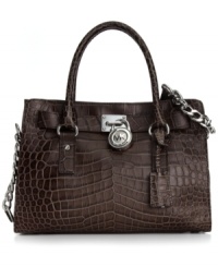 Opt for some exotic appeal with this sophisticated croc-embossed sathel from MICHAEL Michael Kors. Crafted from sumptuous leather and signature hardware accents, it's an effortless way to add elegance to any ensemble. Opt for some exotic appeal with this sophisticated croc-embossed sathel from MICHAEL Michael Kors. Crafted from sumptuous leather and signature hardware accents, it's an effortless way to add elegance to any ensemble.
