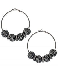 Smoky sophistication, by Style&co. These dusky hoop earrings feature glass crystal beads with spacers. Crafted in hematite tone mixed metal. Approximate diameter: 2-3/8 inches. Smoky sophistication, by Style&co. These dusky hoop earrings feature glass crystal beads with spacers. Crafted in hematite tone mixed metal. Approximate diameter: 2-3/8 inches.