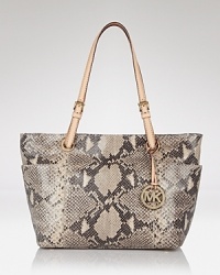 Give your look a luxe, exotic finish with this python-embossed leather tote from the master of chic: MICHAEL Michael Kors. Give your look a luxe, exotic finish with this python-embossed leather tote from the master of chic: MICHAEL Michael Kors.