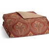 A rich paisley pattern in shades of red and brown define this classic collection from Charisma.