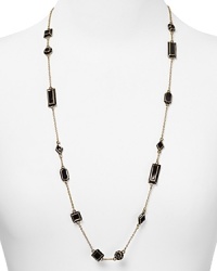 A smattering of shapely jet black bars dress up a simple chain on this long kate spade new york necklace, plated in gold. A smattering of shapely jet black bars dress up a simple chain on this long kate spade new york necklace, plated in gold.