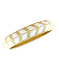 A bold direction. Vince Camuto's bangle bracelet is crafted from gold-tone mixed metal with ivory enamel making up a stylish chevron pattern for added appeal. Approximate length: 8-1/2 inches. A bold direction. Vince Camuto's bangle bracelet is crafted from gold-tone mixed metal with ivory enamel making up a stylish chevron pattern for added appeal. Approximate length: 8-1/2 inches.
