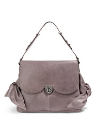 THE LOOKAdjustable shoulder strapCurvy flap with turnlock closureSide bow detailsProtective metal feetOne inside zip pocketTwo inside open pocketsInside logo detailTHE MEASUREMENTShoulder strap, 8 drop17W X 10H X 5½DTHE MATERIALLeatherFully linedORIGINImported THE LOOKAdjustable shoulder strapCurvy flap with turnlock closureSide bow detailsProtective metal feetOne inside zip pocketTwo inside open pocketsInside logo detailTHE MEASUREMENTShoulder strap, 8 drop17W X 10H X 5½DTHE MATERIALLeatherFully linedORIGINImported