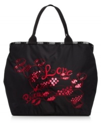 Easygoing with some urban cool, this tote from LeSportsac is the ultimate bag about town. Spacious, sequin splashed with pockets aplenty, it flaunts free-spirited city girl style. Easygoing with some urban cool, this tote from LeSportsac is the ultimate bag about town. Spacious, sequin splashed with pockets aplenty, it flaunts free-spirited city girl style.