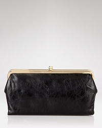 Chicly sized and designed to hold just about everything. Hobo's continental leather wallet is a pretty-practical companion for your purse. Chicly sized and designed to hold just about everything. Hobo's continental leather wallet is a pretty-practical companion for your purse.